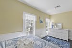 Cozy full/double bedroom with closet and dresser